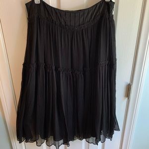 Black silk crepe skirt.